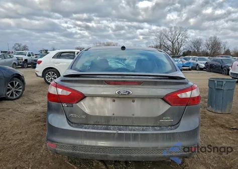 2014 Ford Focus Se z USA, uszkodzony, nr VIN 1FADP3F21EL462506